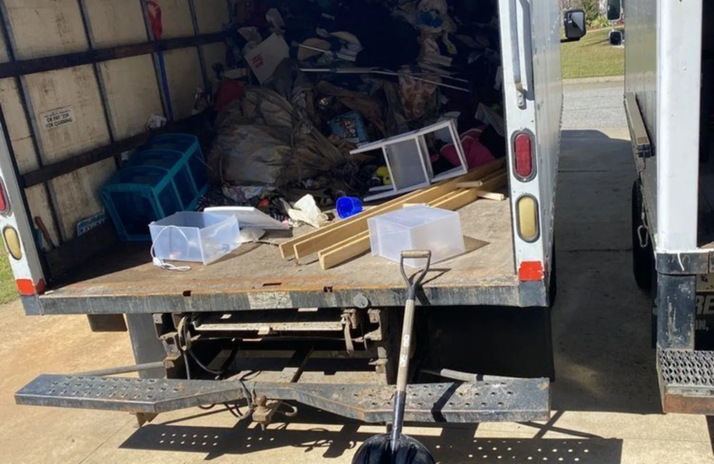 Inside our box truck, loaded with household junk